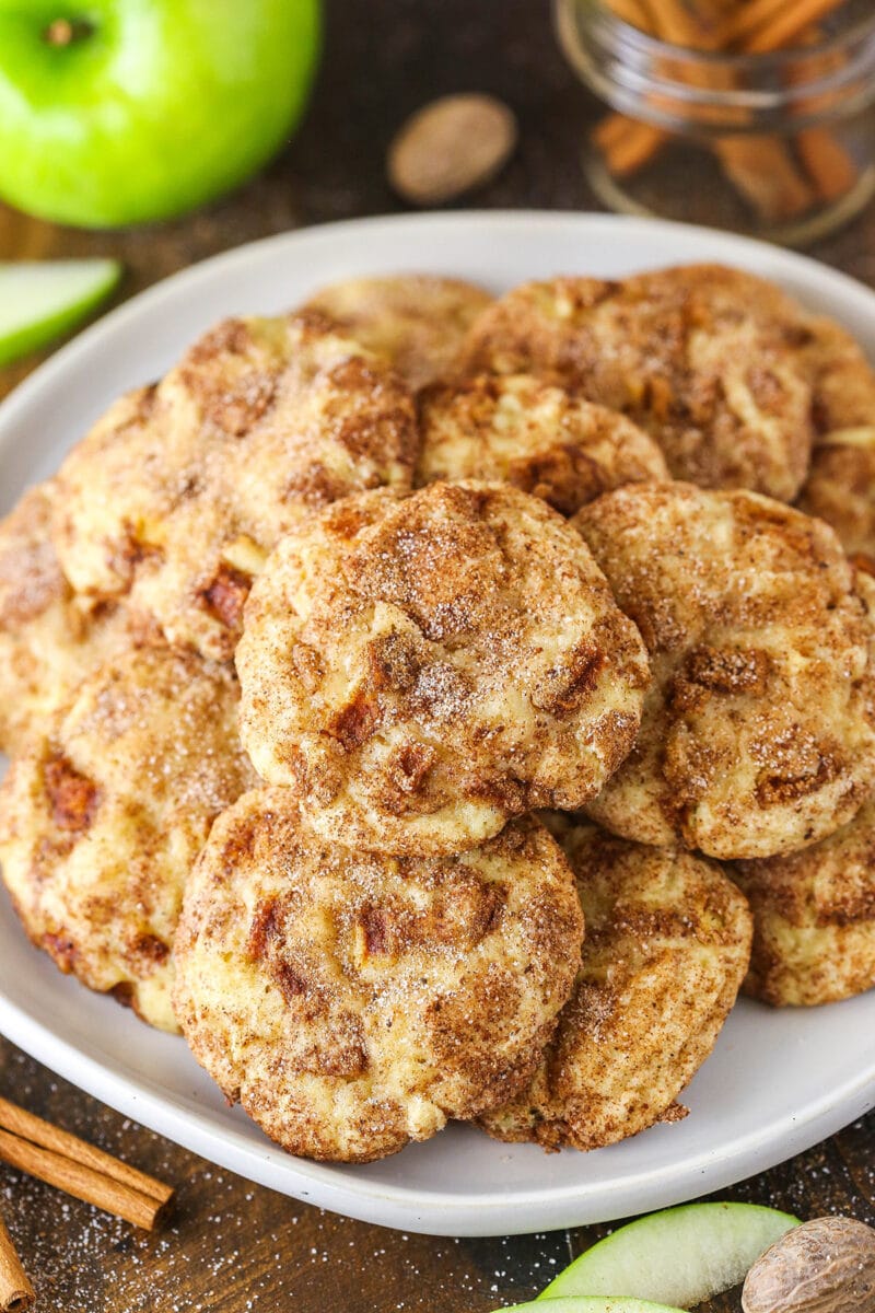 pile of apple snickerdoodles on grey plate on wood surface