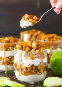 Side image of a Caramel Apple Trifle with a spoon lifting a spoonful out