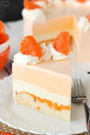 A slice of Orange Creamsicle Ice Cream Cake on a plate